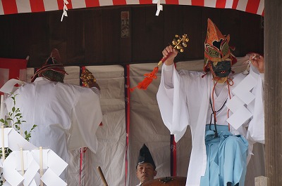two dancers are on the stage of kagura(Japanese traditional folk performing art)