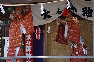 two deities (masked characters) is dancing in kagura (Japanese traditional culture)