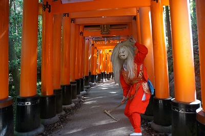 a fox is in Fushimi Inari shrine