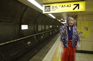 a strange man stands at a station of subway